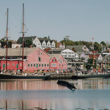 waterfront view of boats and colouful buildings