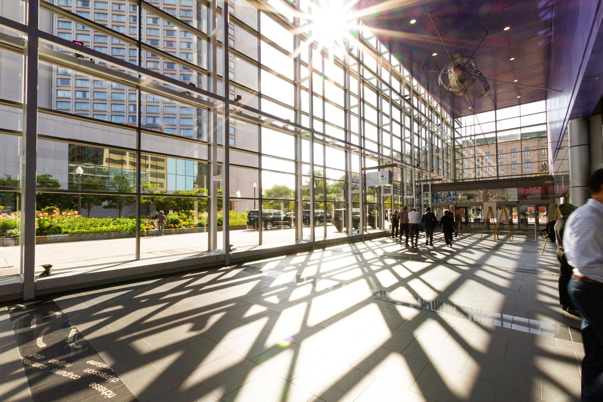 Group of people walking through convention centre