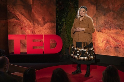 Matrcia Bauer presents on stage at the TED Theatre in New York
