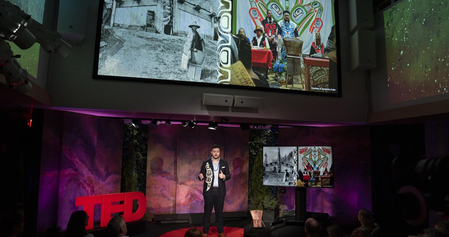 Cohen Bradley presenting on the TED Theatre stage
